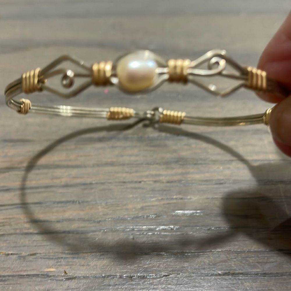 Ronaldo silver and 14kt artisan wire bracelet with one white cultured pearl.